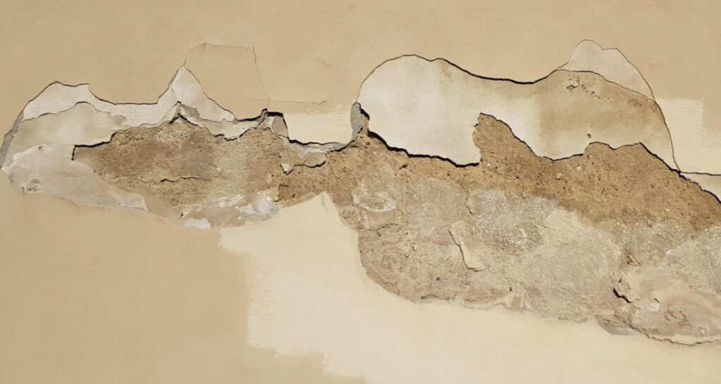 Spotting asbestos-containing artex includes checking property records, visual inspection and individual testing.
